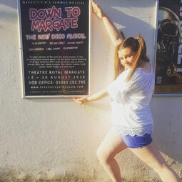 izzy, age 11, seeing an advertisment for her show in the street.